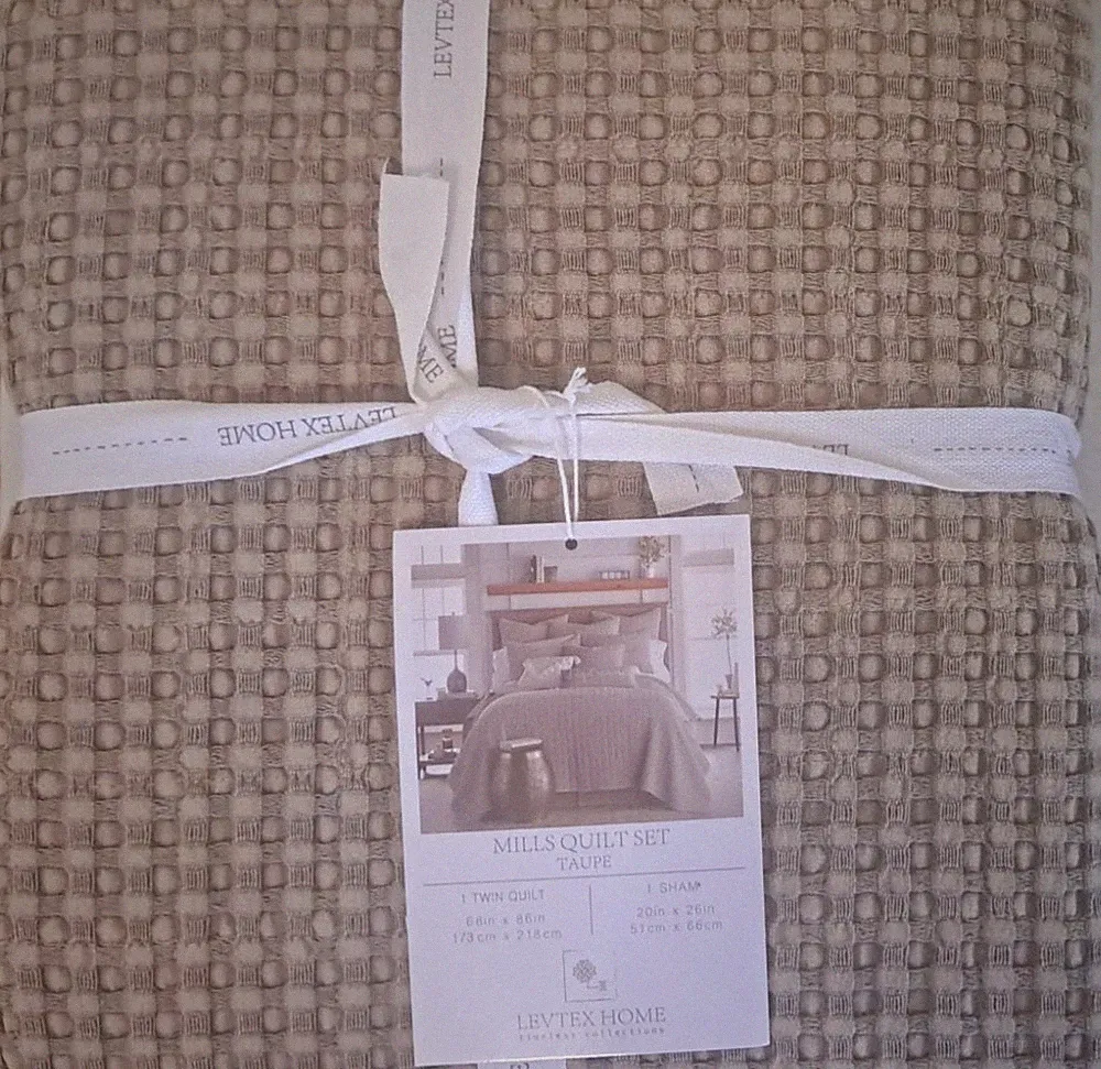 Luxurious Levtex home Mills waffle Taupe twin Quilt wit 1 sham. Priced to sell
